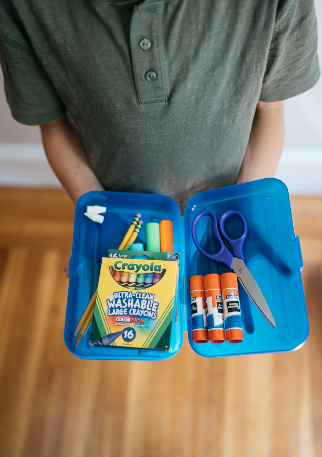 about-me pencil box with school supplies inside