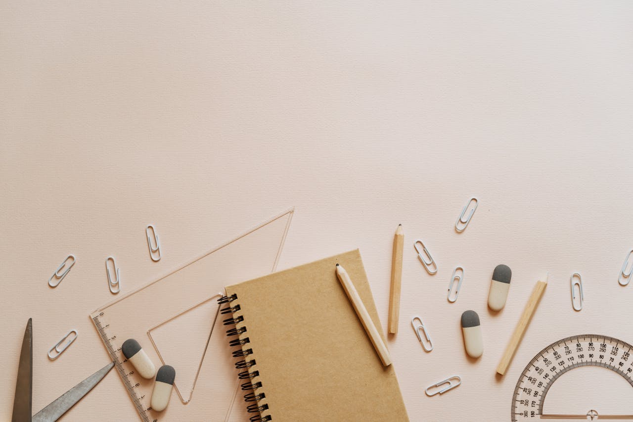 Top view of school supplies with ample copy space, perfect for educational themes.